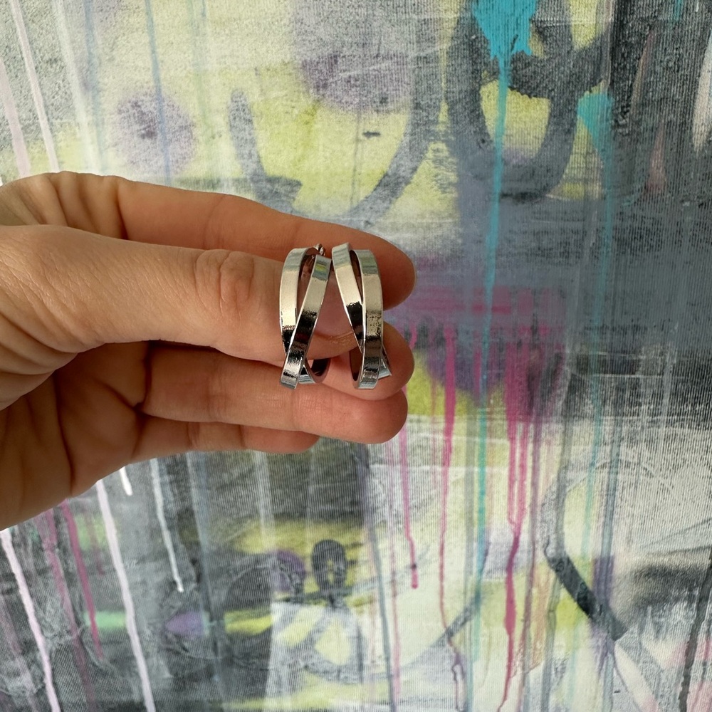 Silver twisted hoops earrings
